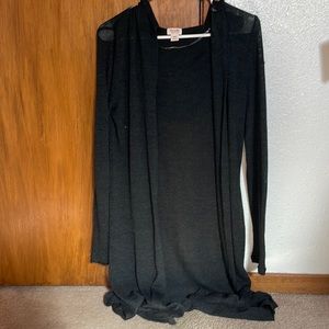 Medium long black cardigan.